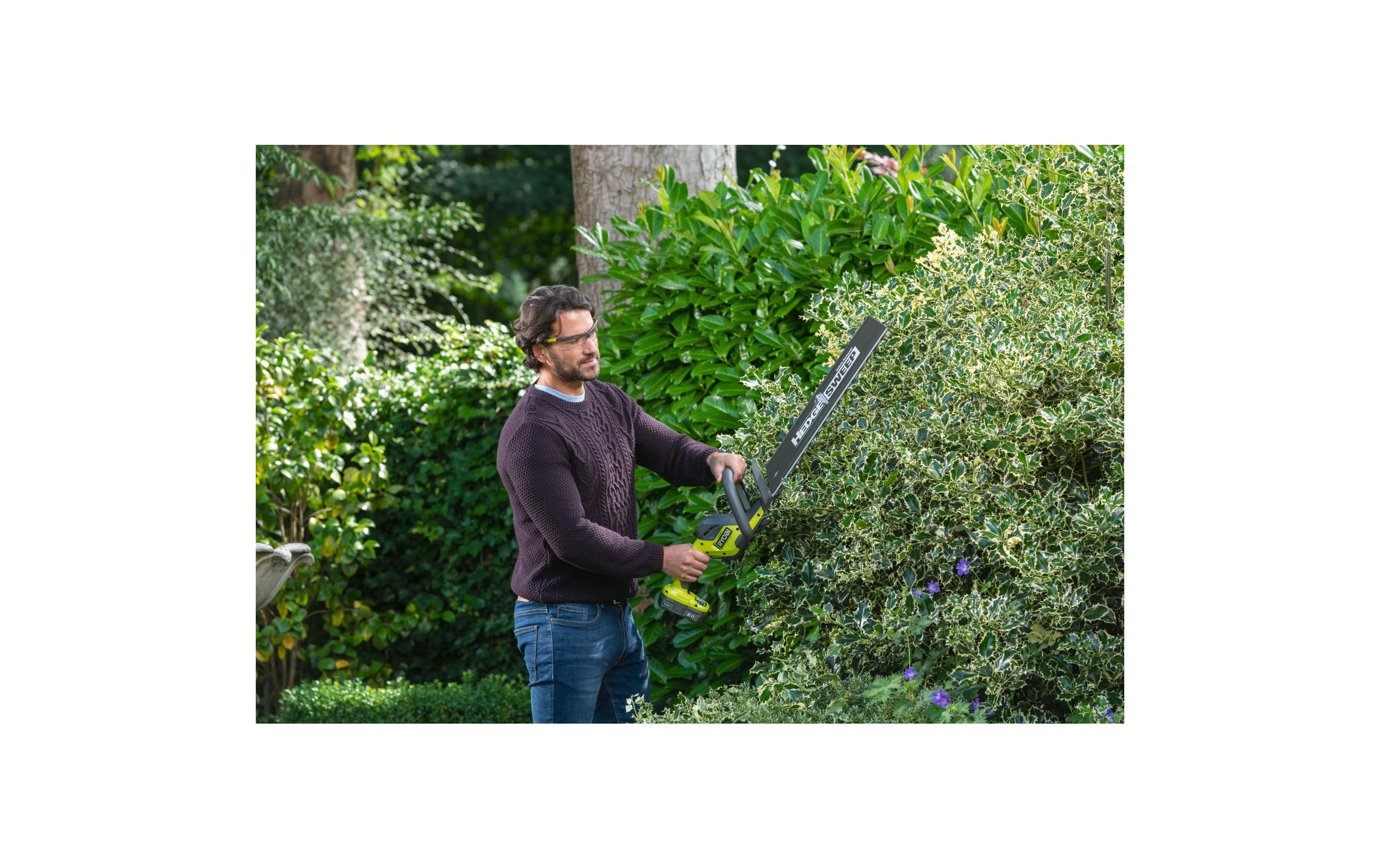 Ryobi ONE+ 18 V Akku-Heckenschere RY18HT50A-0 50 cm, Schwarz/Grün