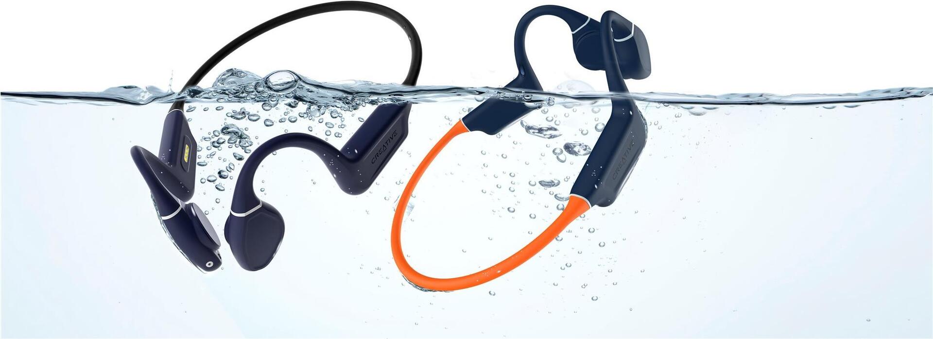 Creative Outlier Free Pro+ Knochenleitungs-Kopfhörer, Bluetooth 5.3, IPX8, 10 Stunden Akku, Mitternachtsblau, Feurig orange