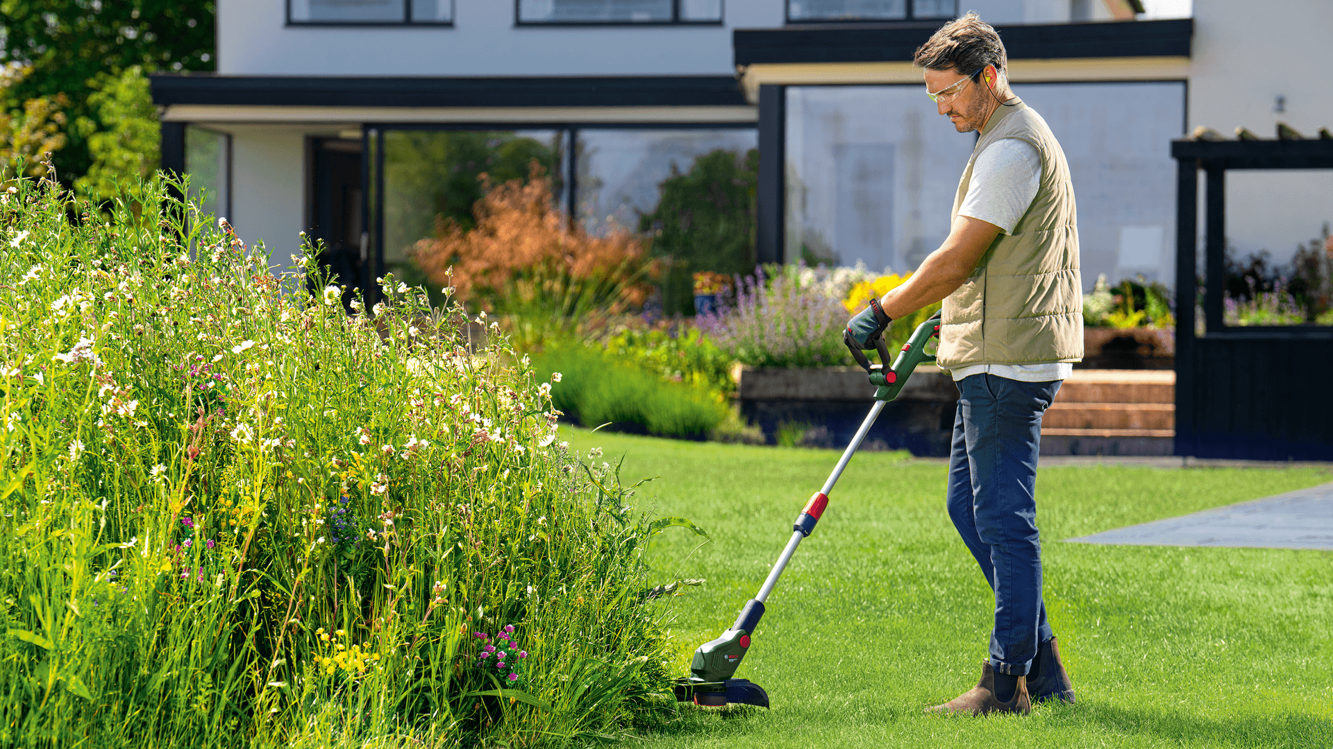 Bosch UniversalGrassCut 18V-26-500 Akku-Rasentrimmer 18 V 2 Ah Schwarz Grün